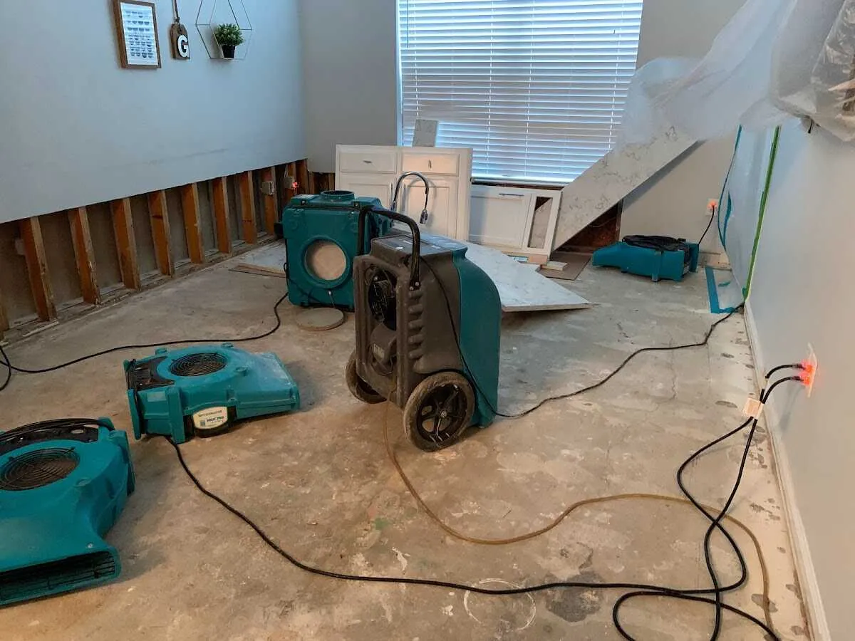 Dehumidifier in flood-cut room for Water Damage Restoration in Taylor